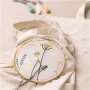 Starten Sie das DIY-Stickset \\\"Blumen\\\".