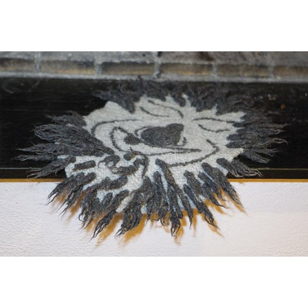 Strickanleitung - Sitzpolster Trollkopf