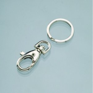 Karabiner, drehbar 20 x 60 mm - silberfarben einteilig mit teilbarem Ring Karabiner, drehbar 20 x 60 mm - silberfarben einteilig mit teilbarem Ring